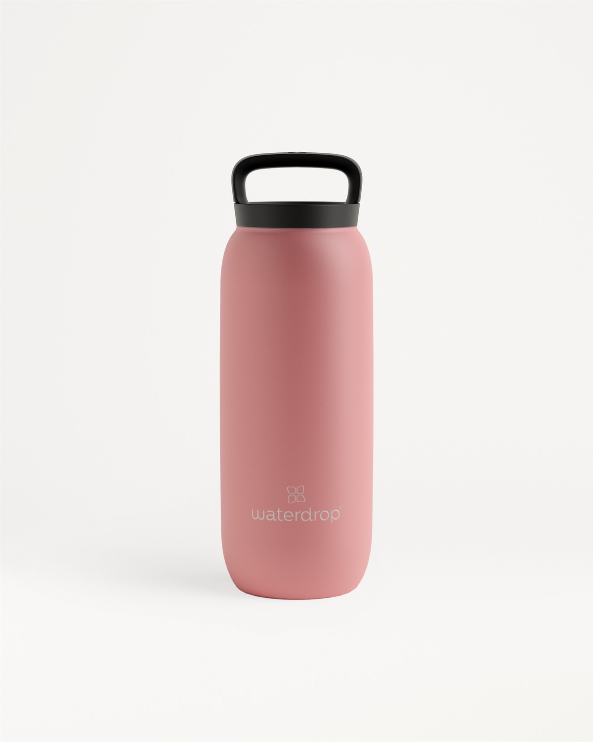 All-Purpose Thermo · Loop Lid, a pink stainless steel water bottle with a black handle, ideal for keeping drinks cold for 24 hours or hot for 6 hours.